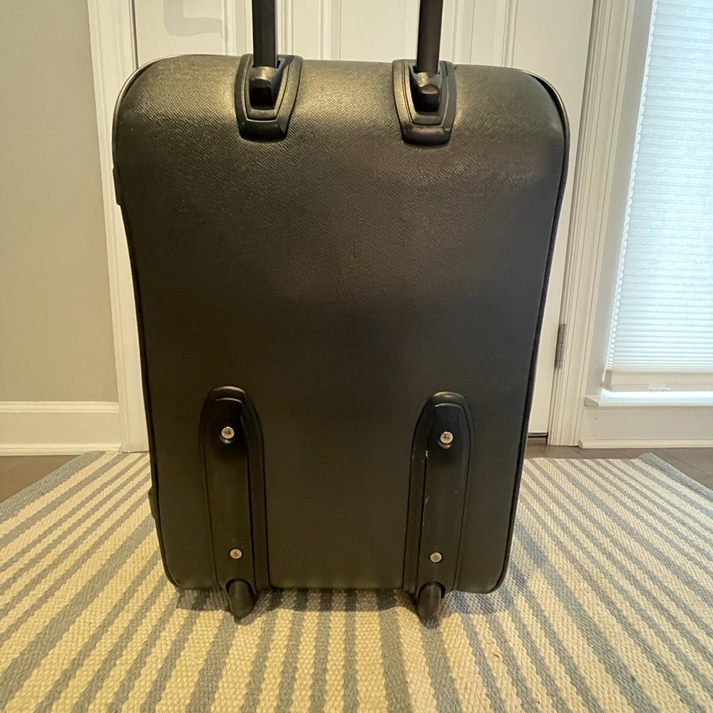 This is a Louis Vuitton travel bag black. - Picture 2 of 16